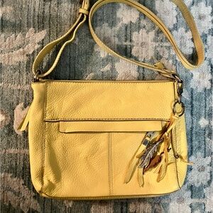 The Sak Yellow Crossbody Bag with Feather Charm